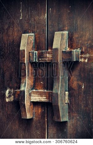 Door bolt closeup in Xiahao Old street in Chongqing, China.