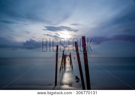 Broken Wooden Fisfing Bridge During Sunset At Khao Pilai In Phang Nga, Southern Of Thailand