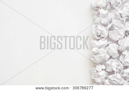 Emotional Barrier. Flat Lay Of Crumpled Paper Ball Pile On White Surface. Abstract Background. Copy 