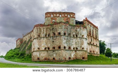 Ancient Brick Medzhybizh Fortress Of The 14-16th Centuries, Angular East Tower Or Officer Tower. Vie