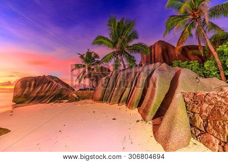 Dramatic Colorful Sky Dusk At Scenic Anse Source Dargent In Seychelles, La Digue. Landscape With Sha
