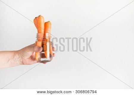 Fresh Carrot In Mason Jar With Water. Save Summer Harvest. Storage. Zero Waste.