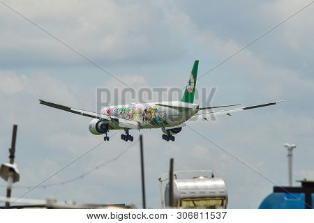 Passenger Airplane Landing At The Airport