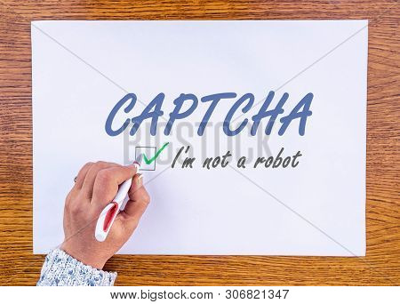Hand Writing Words Captcha I Am Not A Robot On Paper Sheet