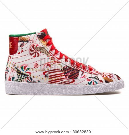 Vienna, Austria - August 10, 2017: Nike Blazer Mid Qs Red, White And Gold Sneaker On White Backgroun
