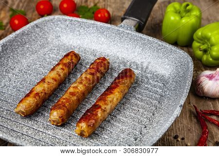 Kupaty In A Frying Pan