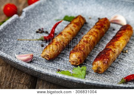 Kupaty In A Frying Pan