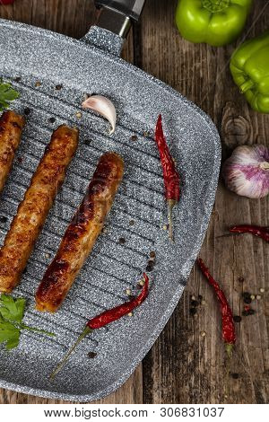 Kupaty In A Frying Pan