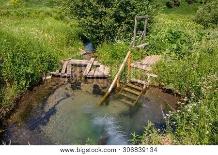 Bath In Cold Spring Water Near The Monastery. Borovsky District, Russia
