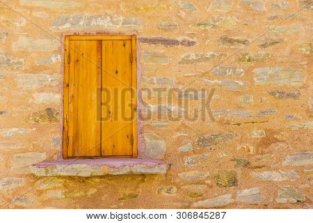 Window Frame Made Of Brown Wood. Old Construction, Ancient Architecture. Enterior Details.