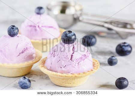 Purple Ice-cream In Waffle Basket With Blackberry. Ice Cream Ball With Berry In Cake Cup. Freezing S