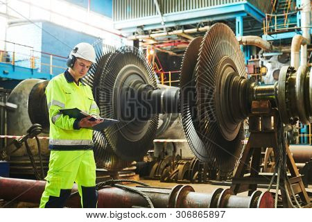 Power plant maintenance. Industial worker