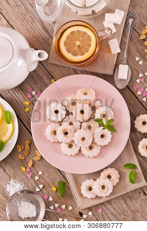 Canestrelli Biscuits With Mint On Wooden Table.