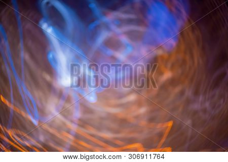 Blurred Abstract Bokeh Background Of City Lights At Night