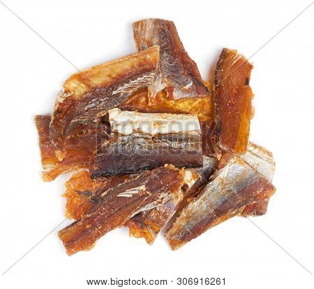 Pieces of cleaned dried fish isolated on white (Dry Peppered Pollack)