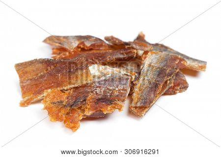 Pieces of cleaned dried fish isolated on white (Dry Peppered Pollack)