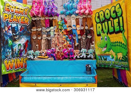Mackay, Queensland, Australia - June 16th 2019: Sideshow Game Attraction To Win A Soft Toy At Pionee