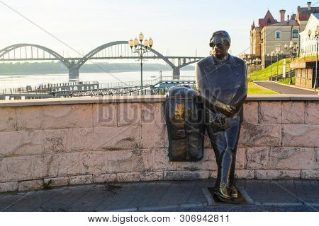 Rybinsk, Russia - June, 10, 2019: monument of a song-writer Lev Oshanin on Volga embankment in Rybinsk, Russia 