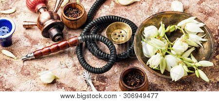 Smoking Pipe And Floral Tobacco