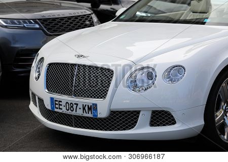Monte-carlo, Monaco - June 16 2019:  Luxury English Cars, White Bentley Continental Gt And Black Lan