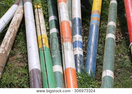 Image Of Show Jumping Poles On The Training Field. Wooden Barriers For Jumping Horses As A Backgroun