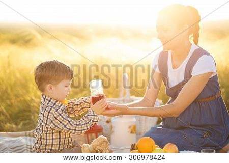 Great Time Is Childhood. Mom - The Most Beloved Person. Cute Mom And Little Son Playing With My Tedd