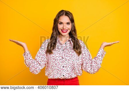 Photo Of Pretty Lady Beaming Smile Two Hands Palms Hold Comparing Proposition Isolated On Yellow Col