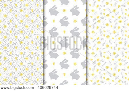Set Of Seamless Easter Patterns. Varied Flowers Leaves And Rabbits In Gray And Yellow On A White Bac
