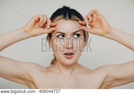 Young Adult Doing Facial Gymnastics Self Massage And Rejuvenating Exercises Face Building For Skin A