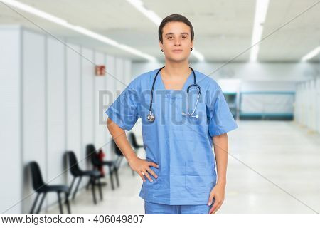 Young Caucasian Male Nurse With Short Hair At Vaccination Station Is Ready For Vacinating Patients A