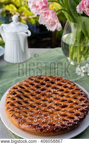 Cherry Pie With Dough Lattice From Limburg, Netherlands Served In Sunny Garden