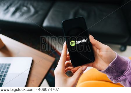 Hand Holding Iphone With Spotify App Logo On The Screen. Rostov-on-don, Russia. 25 January 2021