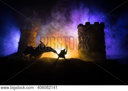 Battle Between Dragon And Heroic Soldiers. Creative Table Decoration. Selective Focus