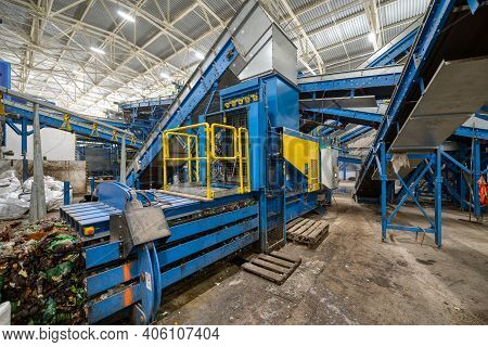 Household Waste Sorting And Recycling Plant. Press For Pressing Plastic Bottles.