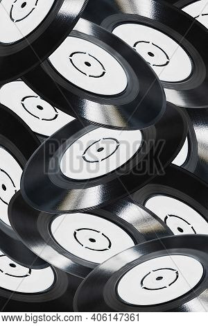 Concept Image Of Mulitple Vinyl Records In Black And White Falling Through The Air.