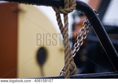 Traditional Dutch Boat And Equipment  In The Canal Near The City Gate Zijlpoort, Leiden, Netherlands