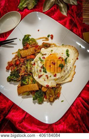 Canned Chinese Food Chop Suey With Fried Sunny Side Up Egg