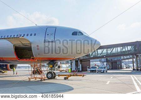 Preflight Service, Aircraft Maintenance, Baggage Is Loading Into The Luggage Compartment Of The Airc