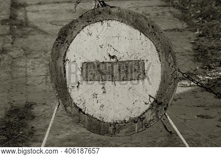 Old Cracked Shabby Road Sign Passage Closed. Brick Is A Road Sign That Blocks Passage On A Dangerous