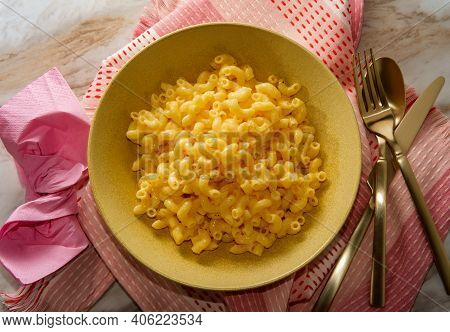 Plain Macaroni And Cheese With Pink Accessories And Decorations
