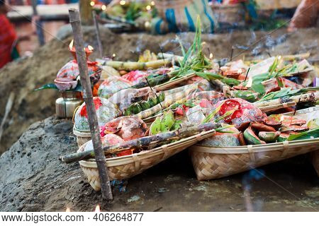 Holy Offerings Of Fruits Flowers Lamps And Cloths In River To Sun God On The Occasion Of Chhath Puja