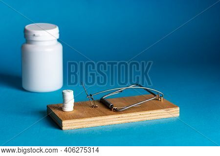 Mousetrap With Pharmaceutical Drugs, Tablets, Pills. Pills, Pills, Medicine Inside The Mousetrap. Ad
