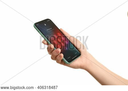 Mykolaiv, Ukraine - July 9, 2020: Woman Holding  Iphone X With Lock Screen On White Background, Clos