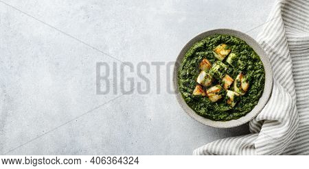 Palak Paneer Indian Traditional Food On Concrete Background, Top View, Copy Space