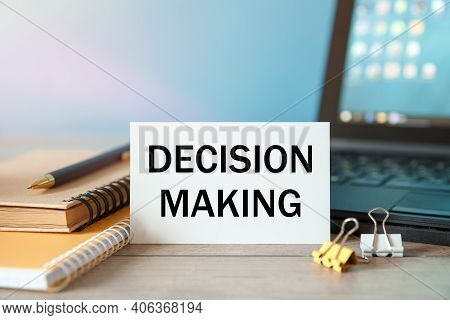 Desktop With Documents, Calculator And Notebook. On A Blockboard Inscription Decision Making
