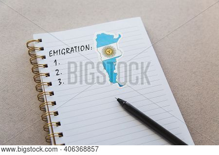 Notebook With Flag And Map Of Argentina, Lettering Emigration