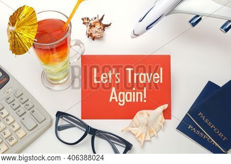 Let's Travel Again - The Inscription On The Notebook, Cocktails, Plane, Documents. Travel Concept.