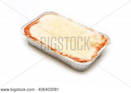 The Semifinished Lasagne In The Aluminium Tub Isolated On A White Background. The Fast Ready To Cook