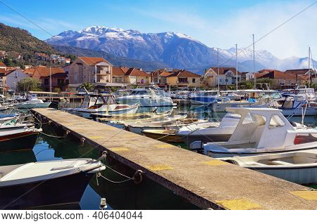 Fishing Boats In Harbor. Winter Mediterranean Landscape. Montenegro. View Of Marina Kalimanj In Tiva