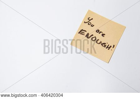 You Are Enough Text Written On Yellow Sticky Note